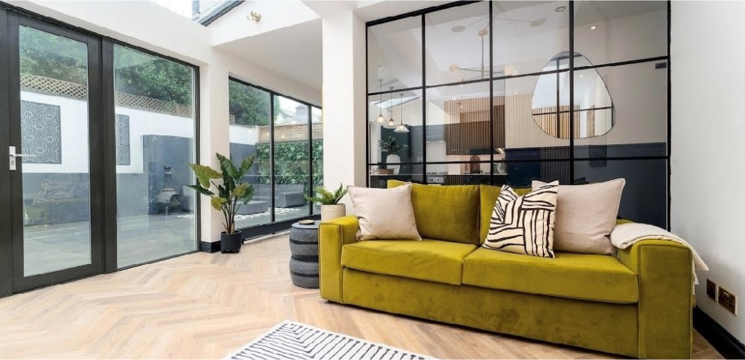 Example of a glass partition in a room for increase the natural light flow